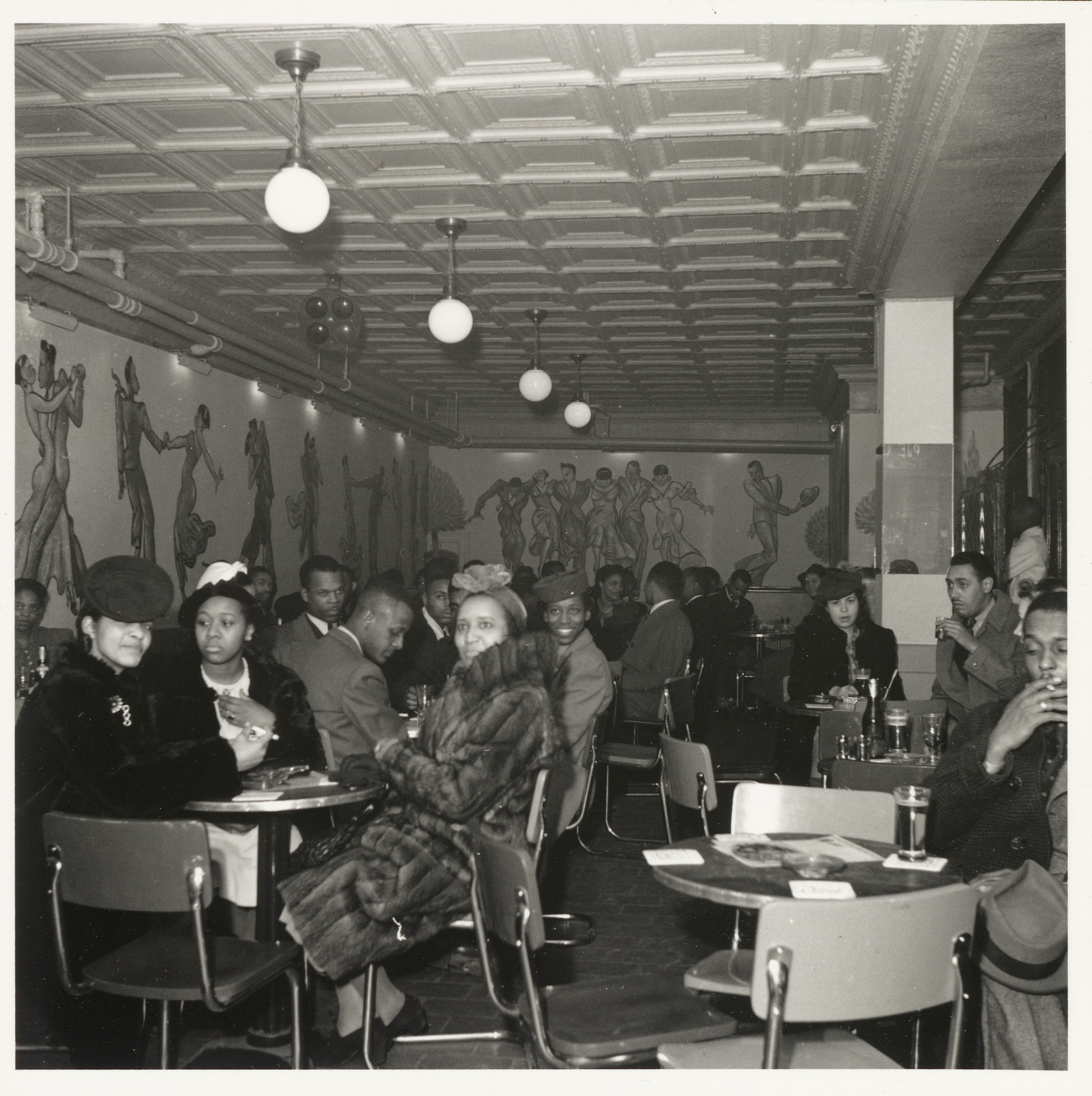 Patrons at tables at the Spot Cafe at 703 French Street in Wilmington on March 20, 1940. (Delaware Historical Society)
